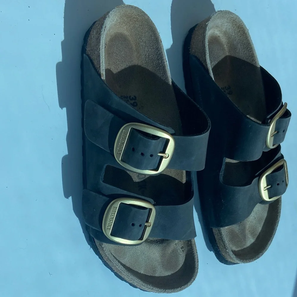 Birkenstock Black Two-Strap Sandals with Gold Buckles - Picture 2 of 5